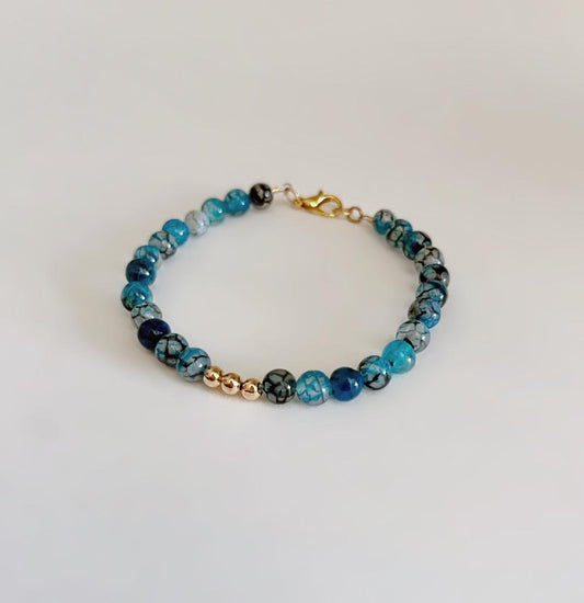 Blue Agate Dragon Vein Beaded Bracelet With Gold Clasp And Gold Trio Centerpiece Beads